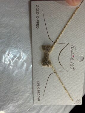 DOG BONE NECKLACE SO CUTE!!